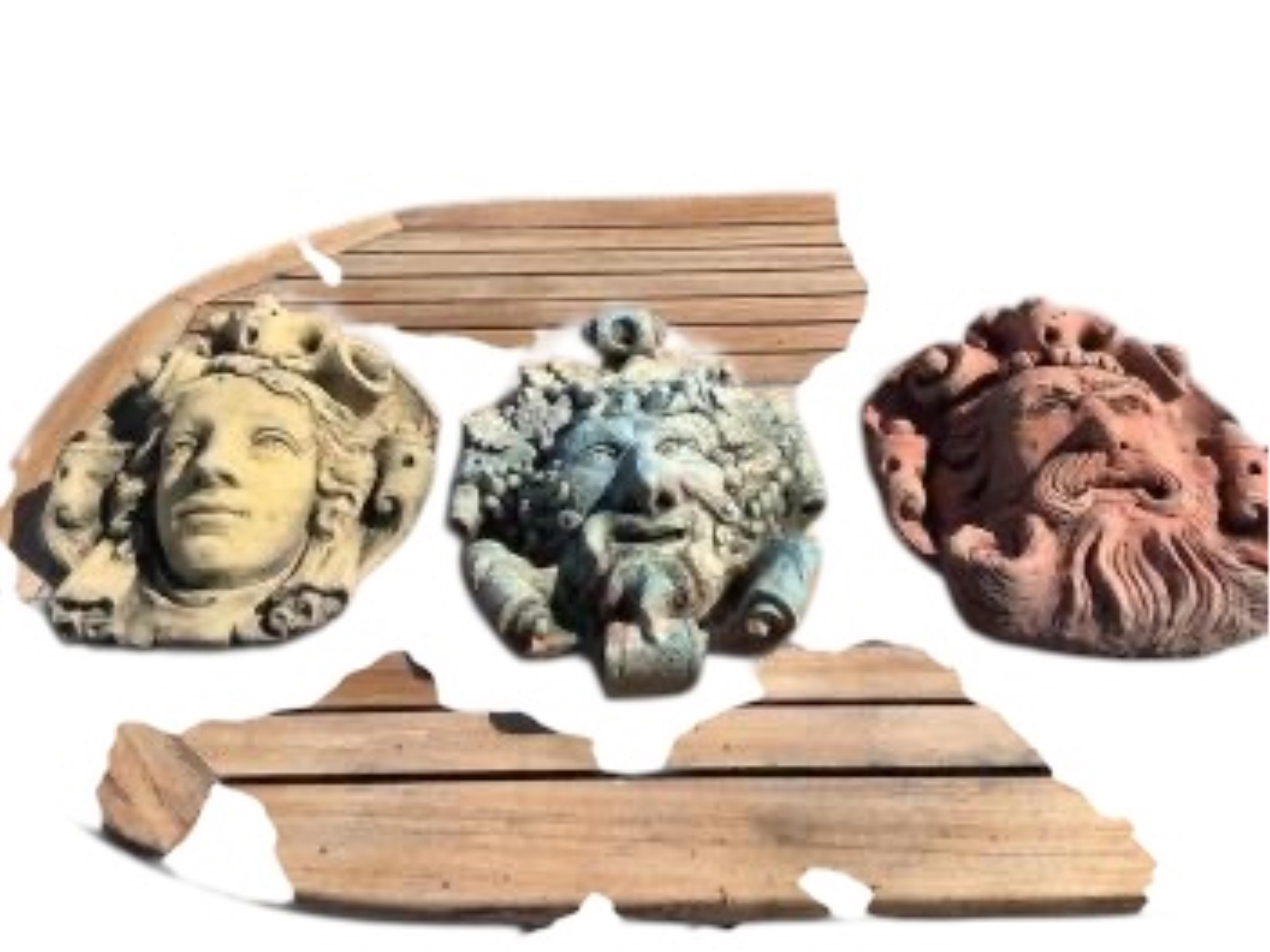 Three cast stone and terracotta garden wall mask appliqués, largest height 42cm